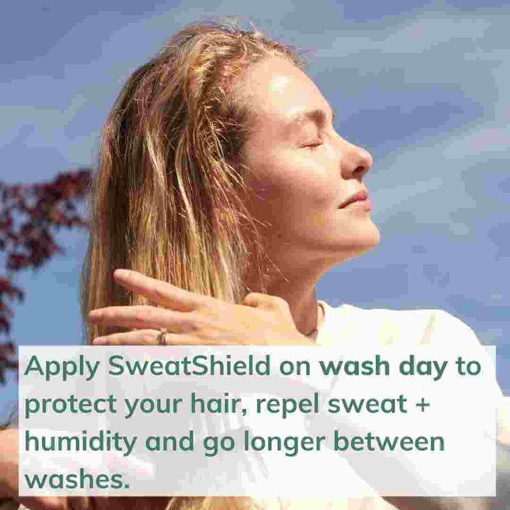 Image of woman delighted after using SweatShield leave-in conditioner
